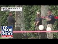 Secret Service agents spotted AK-47 through bushes while Trump was golfing