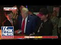 Watch: Trump makes transaction with Bitcoin at NYC bar