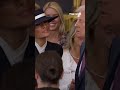 Trump's cheek kiss is blocked by Melania's hat