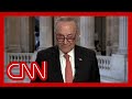 Schumer reacts to Democrats holding signs, walking out of Trump address