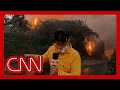 ‘Out of control’: CNN reporter on scene describes Los Angeles wildfire conditions