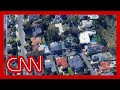 Erin Burnett shows striking before images of neighborhood destroyed by fire